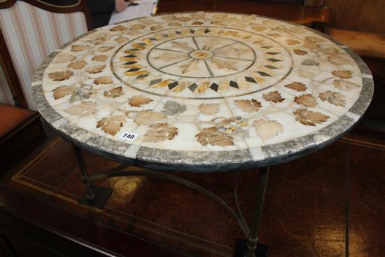 Circular table,with inlaid marble top on gilt metal base